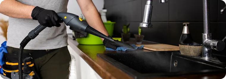 Kitchen being cleaned